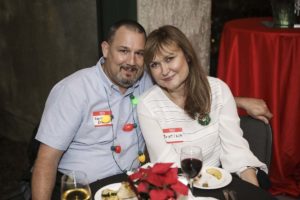 Smiling couple at festive holiday dinner