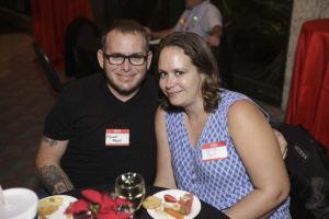 Smiling couple at dinner table