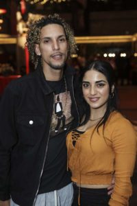 Couple posing at evening event