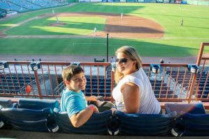 Mother and son at baseball stadium